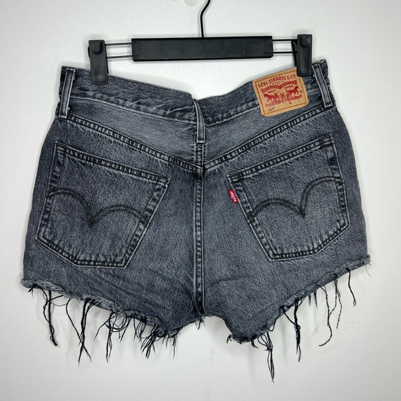 Levi’s high rise distressed black washed jean shots with grommets. Button fly. - Picture 2 of 7